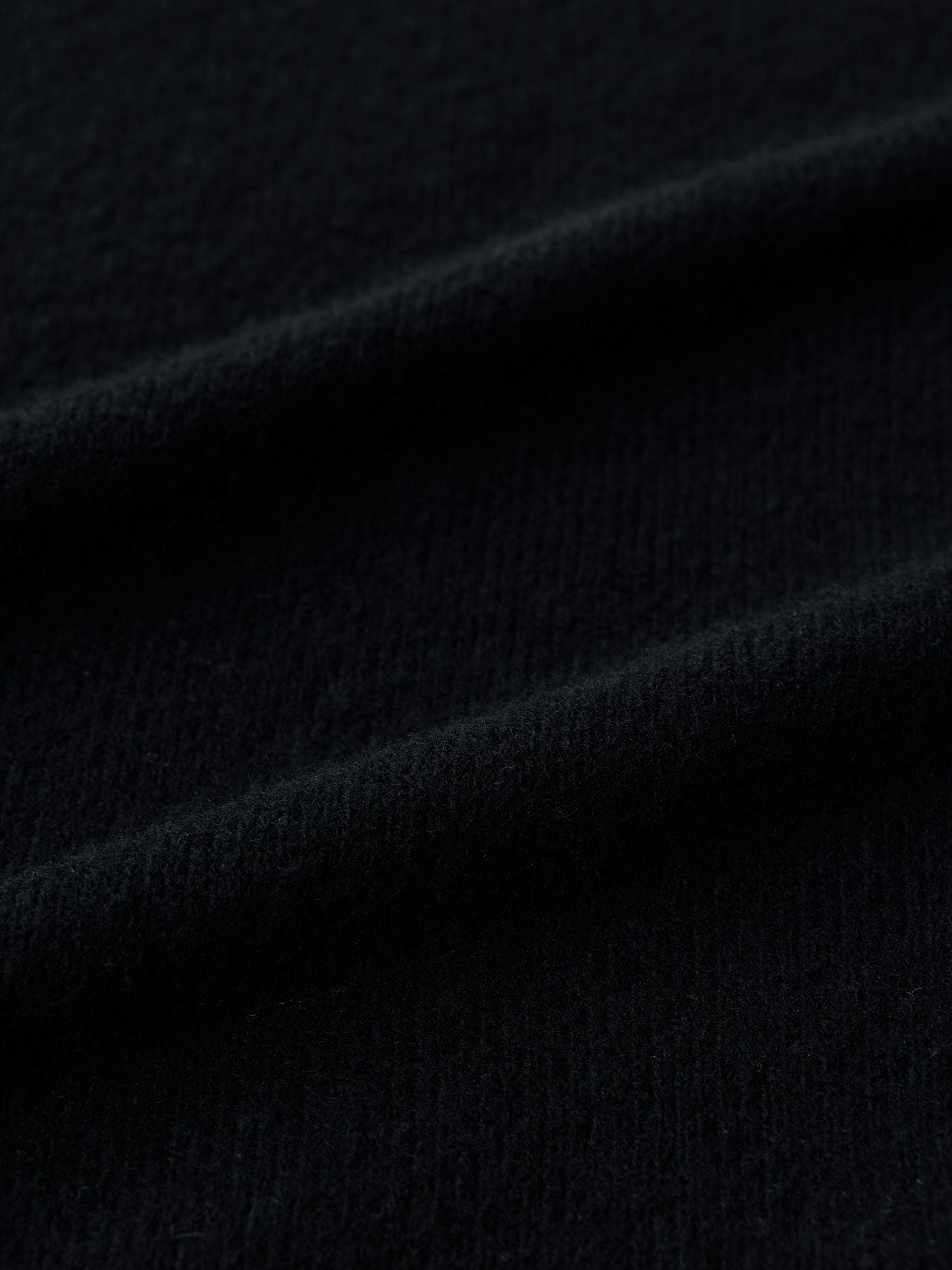 ウールリヨセルハイネックニット