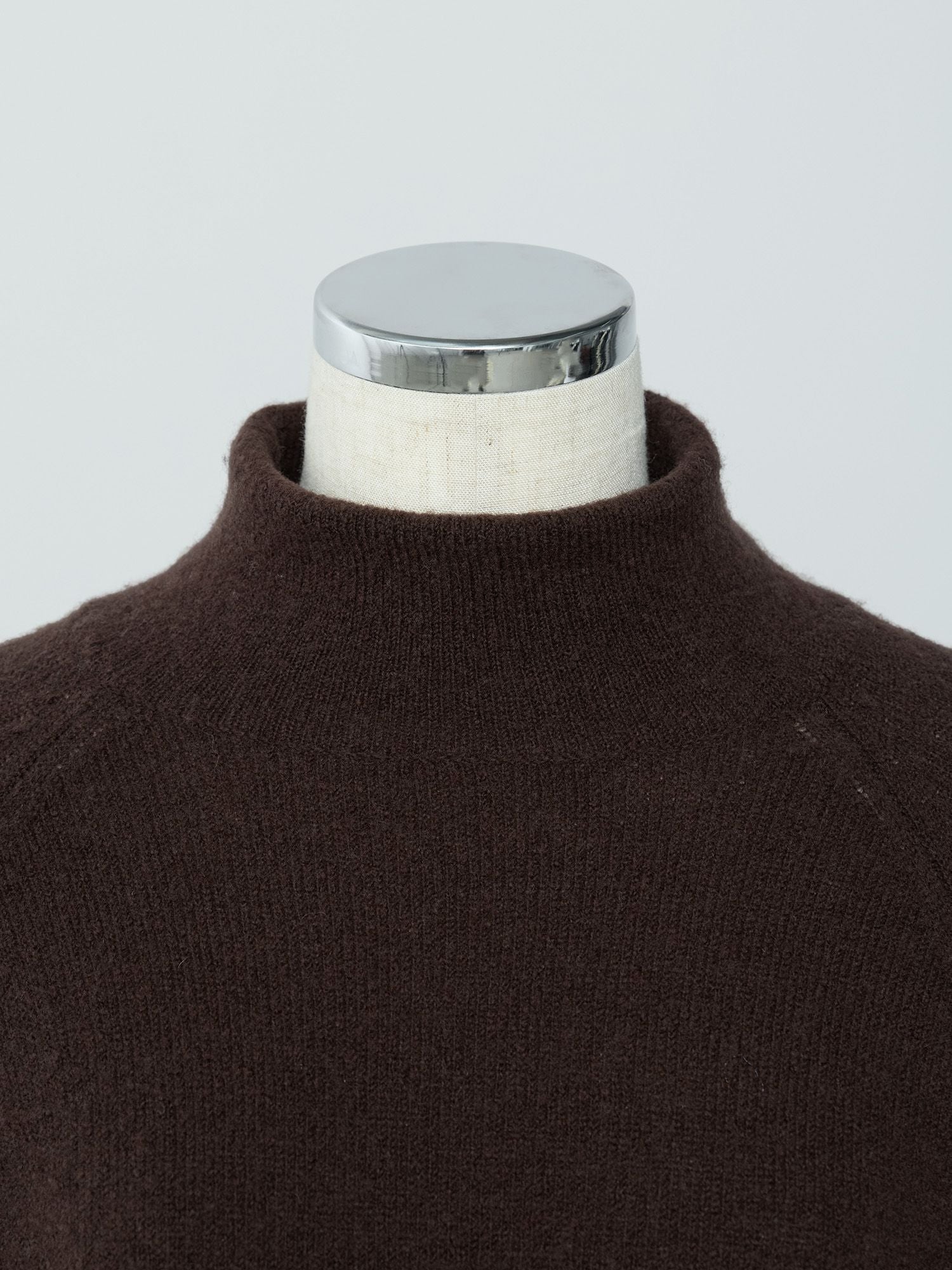 ウールリヨセルハイネックニット